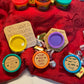 Set of 8 colorful mini Play-Doh containers with personalized engraved wooden lids, displayed on a red decorative cloth. Perfect for Valentine’s Day gifts, party favors, or classroom exchanges.