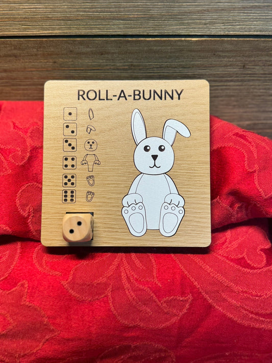 Wooden Roll-A-Bunny game with an adorable bunny illustration, engraved dice instructions, perfect for family fun or classroom activities.