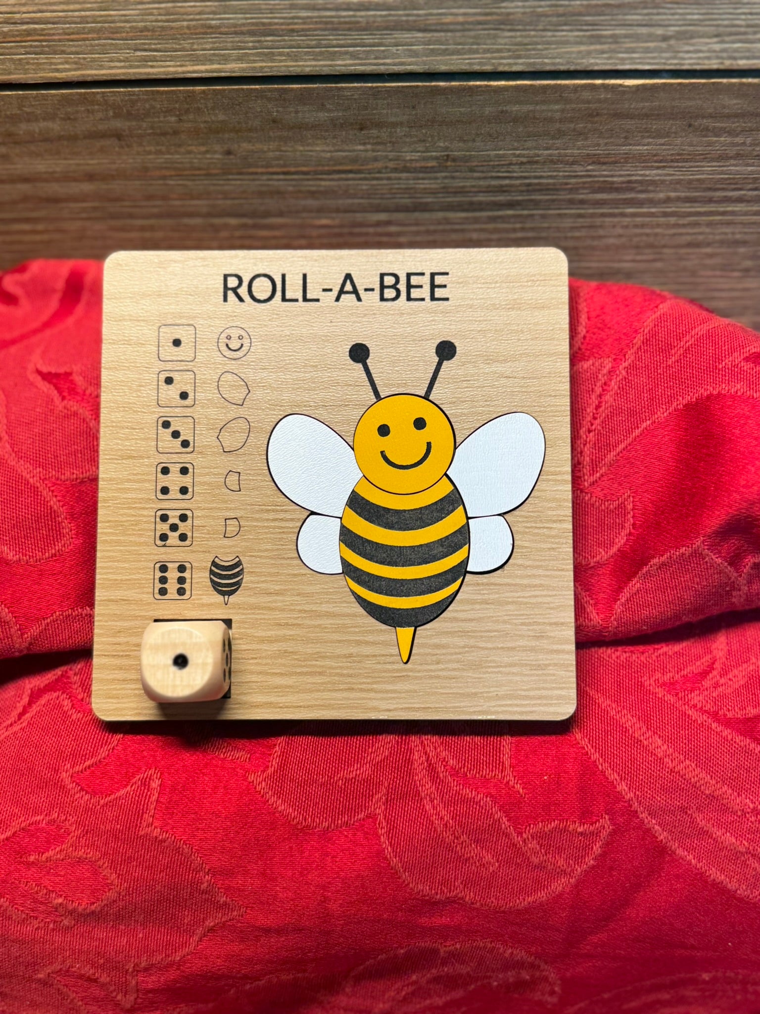 Roll-A-Bee wooden dice game with a vibrant red tulip design, ideal for craft-loving kids and adults