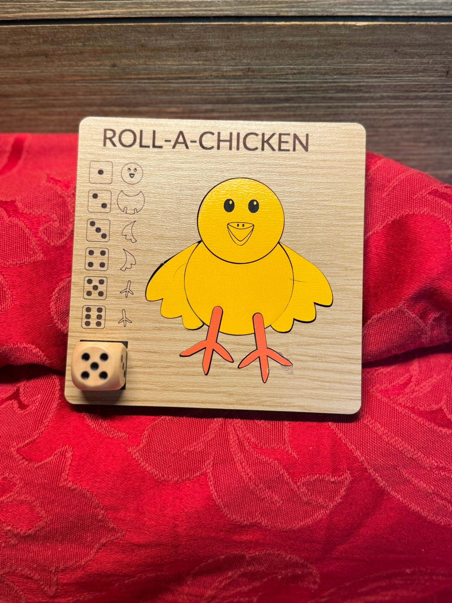 Roll-A-Chicken wooden dice game with a vibrant red tulip design, ideal for craft-loving kids and adults