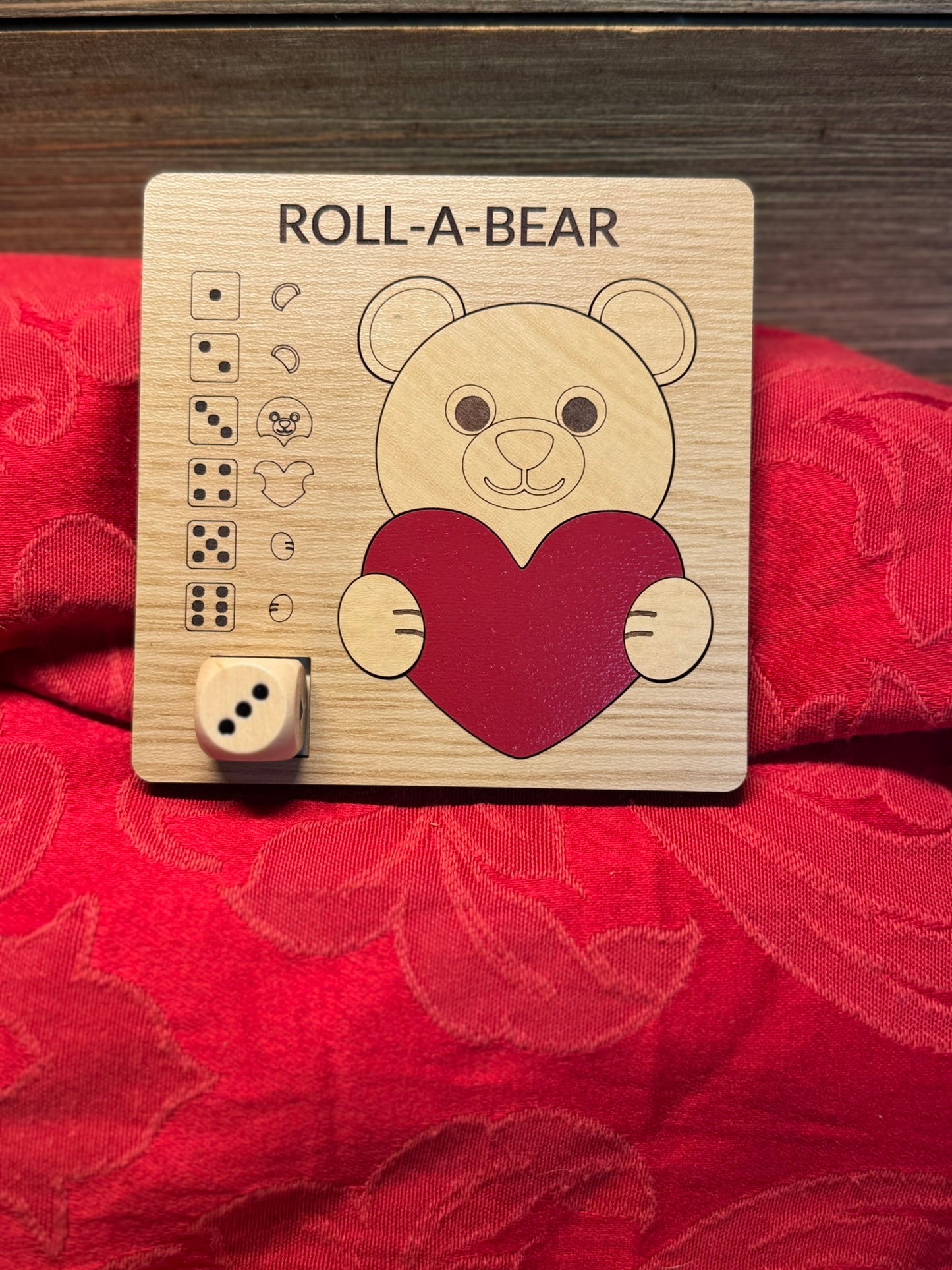 Roll-A-Bear wooden dice game with a vibrant red tulip design, ideal for craft-loving kids and adults