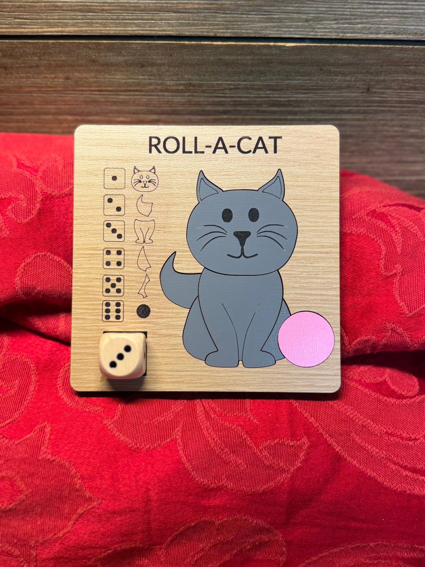 Roll-A-Cat wooden dice game with a vibrant red tulip design, ideal for craft-loving kids and adults