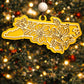 Yellow North Carolina state ornament with laser-cut dogwood flower overlay, hanging on a Christmas tree